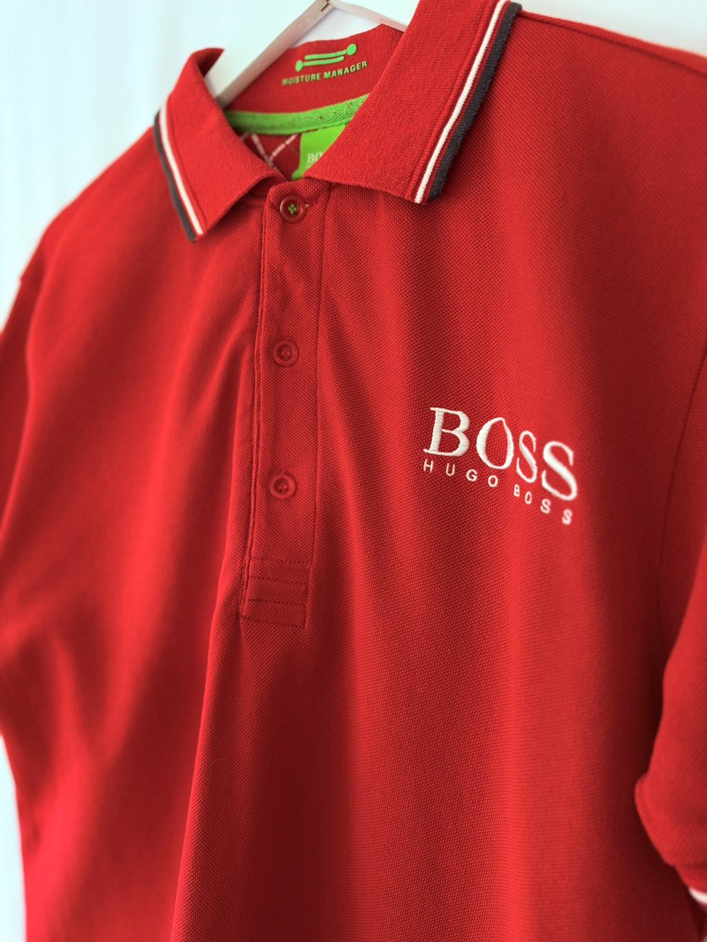 BOSS Hugo Boss red polo shirt angled view