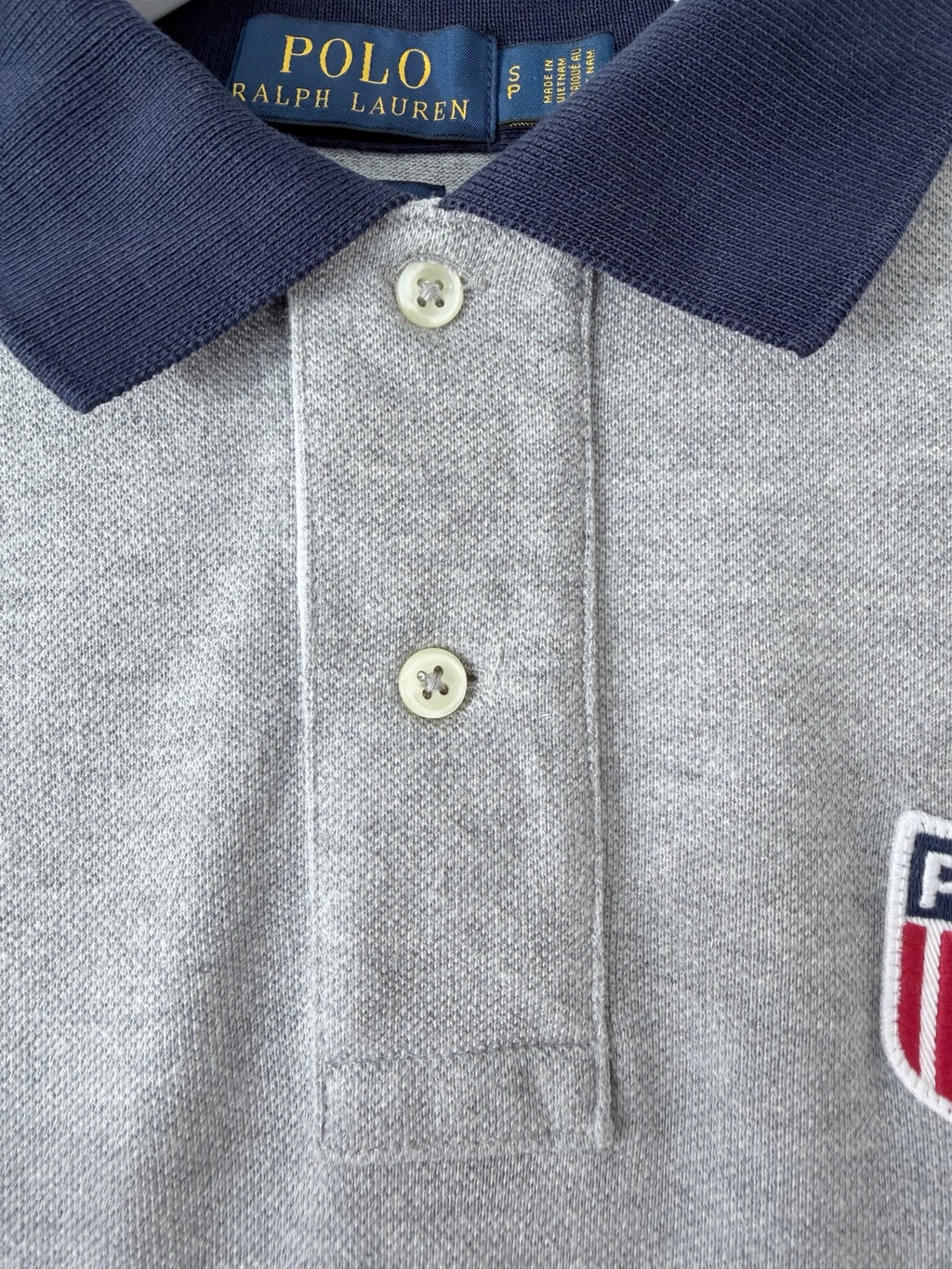Polo Ralph Lauren grey polo shirt collar and label detail