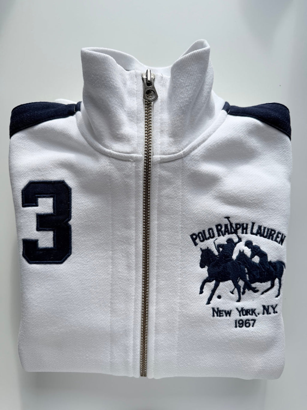 Polo Ralph Lauren white navy track jacket folded front