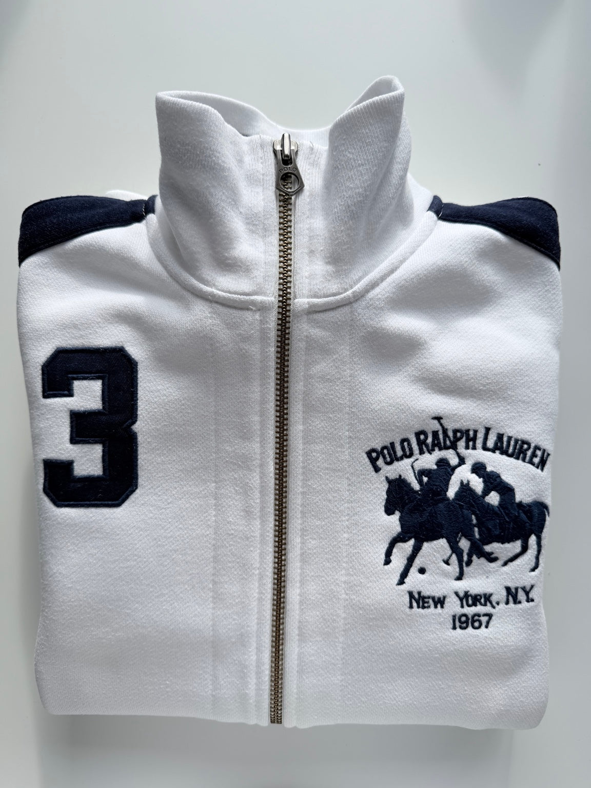 Polo Ralph Lauren white navy track jacket folded front