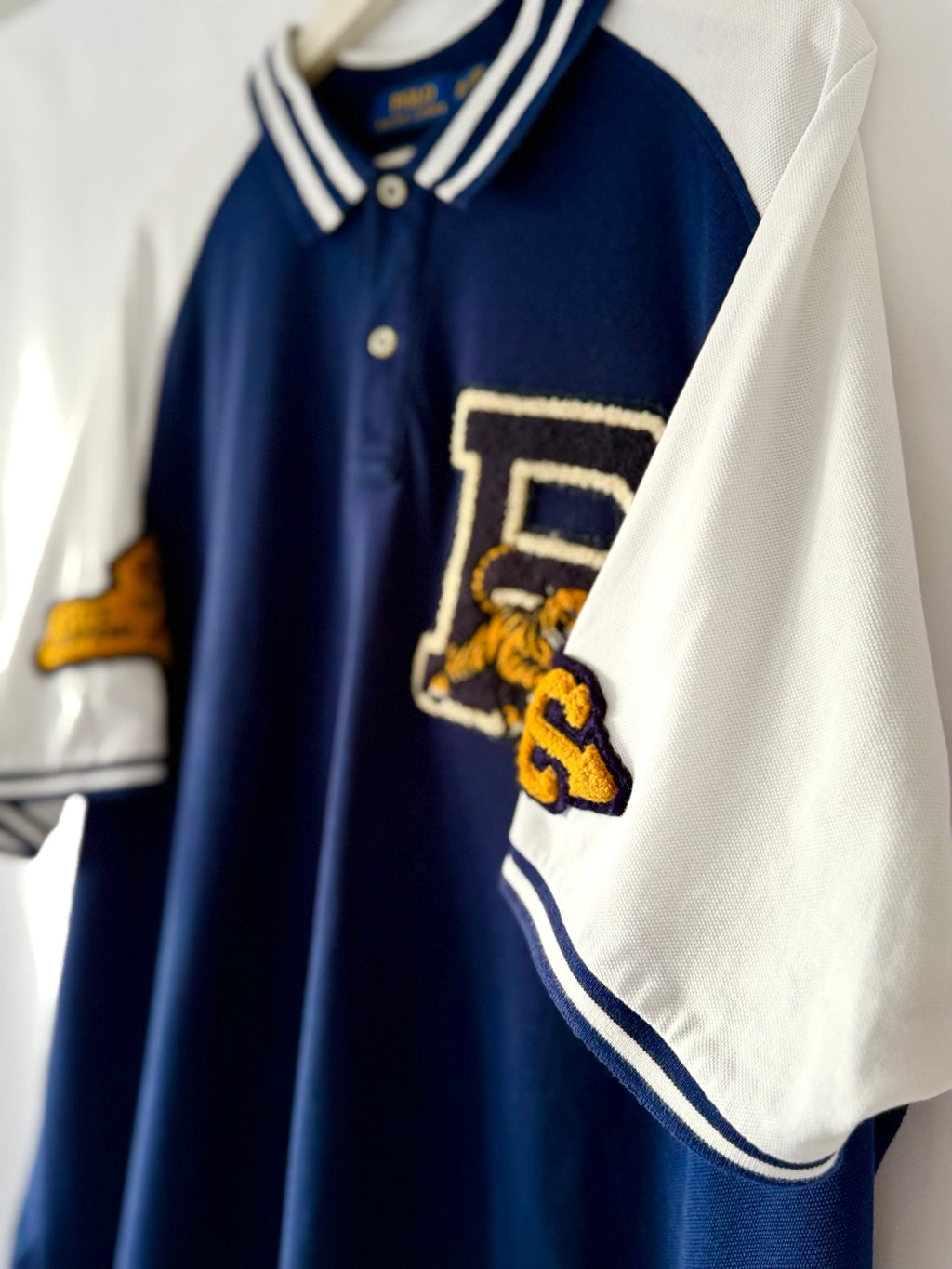 Polo Ralph Lauren navy and white varsity polo shirt front angle
